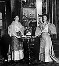 A two Filipina wearing a Maria Clara gown or traje de mestiza 1899
