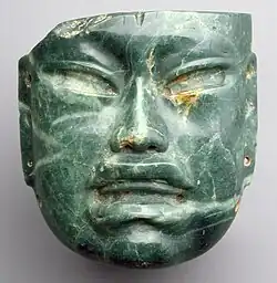 Mask; 10th–6th century BCE; jadeite; height: 17.1&nbsp;cm, width: 16.5&nbsp;cm; Metropolitan Museum of Art