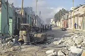 Clădiri și mașini distruse în explozia de pe 14 octombrie