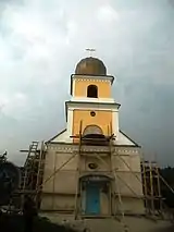 Biserica în restaurare, după un incendiu (iunie 2013).