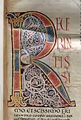 R anluminat într-un manuscris medieval italian, circa 1150