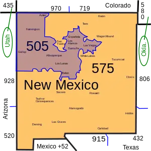 The map indicates the geographical regions in the state of New Mexico, served by area codes 505 and 575