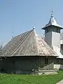 Biserica pe latura nord-vestică