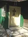 Ușa de intrare în pridvorul bisericii