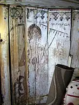 cu coasa și furca reprezentată în pronaosul bisericii