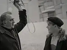 Bruno Zanin în rolul lui Titta și Fellini în timpul filmărilor.
