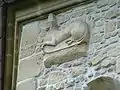 Latura sud-estică, detaliu: basorelief reprezentând un leu