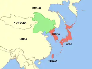 Manciuria (verde) alǎturi de Japonia