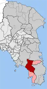 Le district municipal de Kalývia Thorikoú (en rouge), au sein du dème du Saronique (rose) et du district régional d'Attique de l'Est (gris foncé).