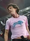 Mick Jagger, interpret de muzică rock, compozitor, actor, producător de film și om de afaceri britanic (The Rolling Stones)