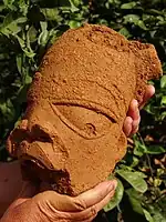 Cap de figurină Nok