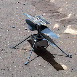 A robotic helicopter on the surface of Mars.