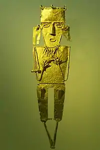 Tunjo care reprezintă un om care poartă cercei