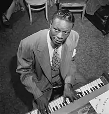 Nat King Cole, pianist, compozitor, interpret de jazz, cântăreț și actor american