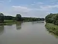 Râul Suceava văzut de pe podul rutier din Ițcani - în amonte