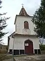 Biserica ortodoxă „Sfântul Mare Mucenic Gheorghe” (1909, construită pe locul unei biserici vechi de lemn)