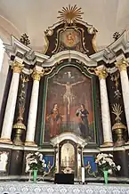 Altarul baroc, datat 1791, realizat de Daniel Petersberger din Mediaș