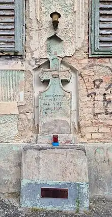  Cruce în zidul unei case din Șchei (Crucea-Benghii )