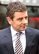 Rowan Atkinson, comediant, actor englez