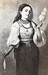 Tânără țărancă torcând