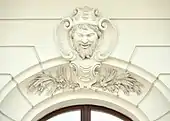 Mascaron masculin într-un cartuș în Austria