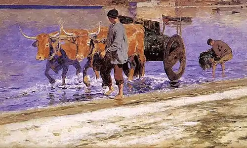 Un cărucior plin de alge marine