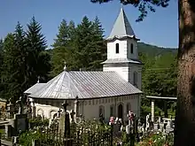 Biserica și cimitirul romano-catolic „Sfântul Gheorghe” din cartierul Gura Slănicului