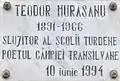 Placa comemorativă de pe faţada şcolii „Teodor Murăşanu” din Turda, str. Dr.I.Raţiu nr. 53