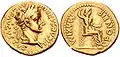 Aureus bătut sub Tiberius, la Lugdunum (Lyon), prin anii 36-37. Avers: cap laureat spre dreapta / revers: PONTIF[ex] MAXIM[us], Livia (ca și Pax) așezată spre dreapta pe scaun, ține în mâini un sceptru și o ramură de măslin; picioarele pe un taburet; o singură linie mai jos, sub scaun; picioarele ornate.