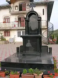 Obeliscul ridicat în memoria revoltei din 1935- Mănăstirea Sfânta Treime (stil vechi) - satul Cucova