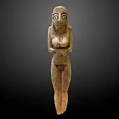 Figurină feminină mortuară; 4400-4000 î.Hr.; os de crocodil; înălțime: 8,7 cm; Luvru