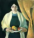 Porträt mit Äpfeln (Porträt der Frau des Künstlers) – Porträt cu mere (Portretul soției pictorului) (1909) — Tabloul se află la Galeria Lenbachhaus din cartierul muzeal Kunstareal din München