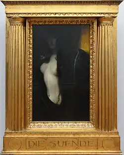 Die Sünde, de Franz Stuck, din 1893, într-o ramă cu o pereche de coloane dorice angajate