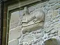 Latura sud-estică, detaliu: basorelief reprezentând un leu