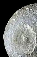 Mimas displays subtle color differences(false-color).