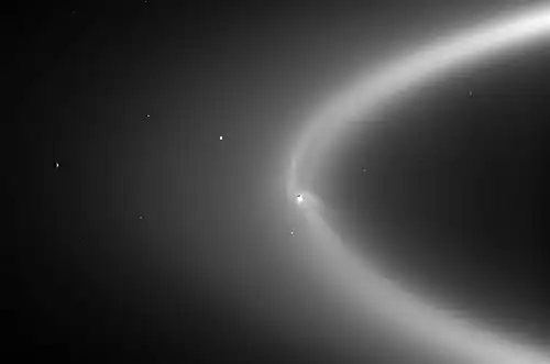 Enceladus orbiting within Saturn's E&nbsp;ring