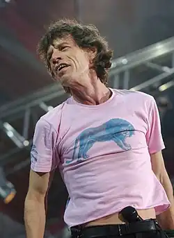 Mick Jagger, interpret de muzică rock, compozitor, actor, producător de film și om de afaceri britanic (The Rolling Stones)