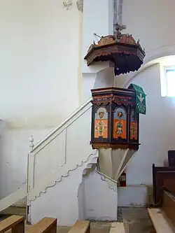 Amvonul, realizat tot în perioada barocului, datat 1709