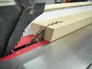 Low blade cutting wood