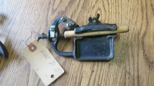 unknown wood working tool with cutter on handle and adjustable stop on end