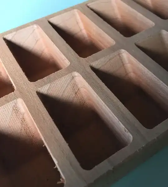 A sample of the pockets I need to sand. Each one is a little larger than a cubic inch, and slanted on one side.