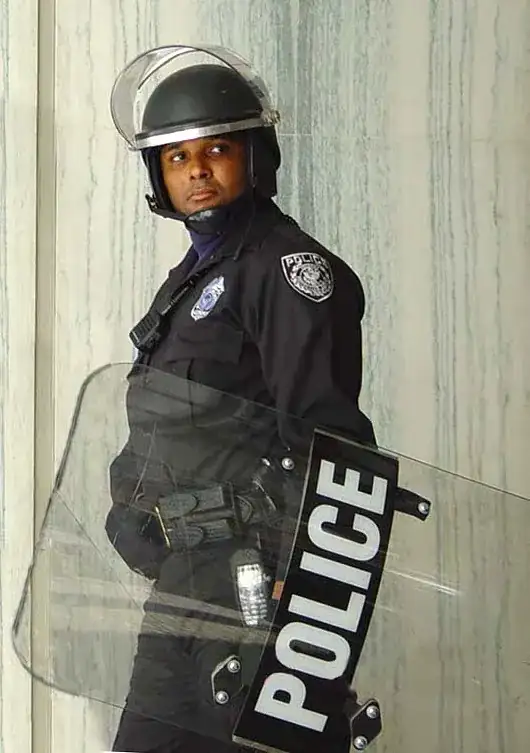 cop with riot shield