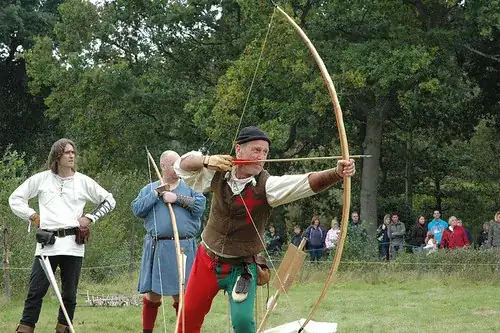 Big lad with a big bow and a big arrow. Still not as good as a gun.